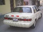 grianghraf 4 Carr Mercury Topaz Sedan 4-doras (1 giniúint 1984 1994)
